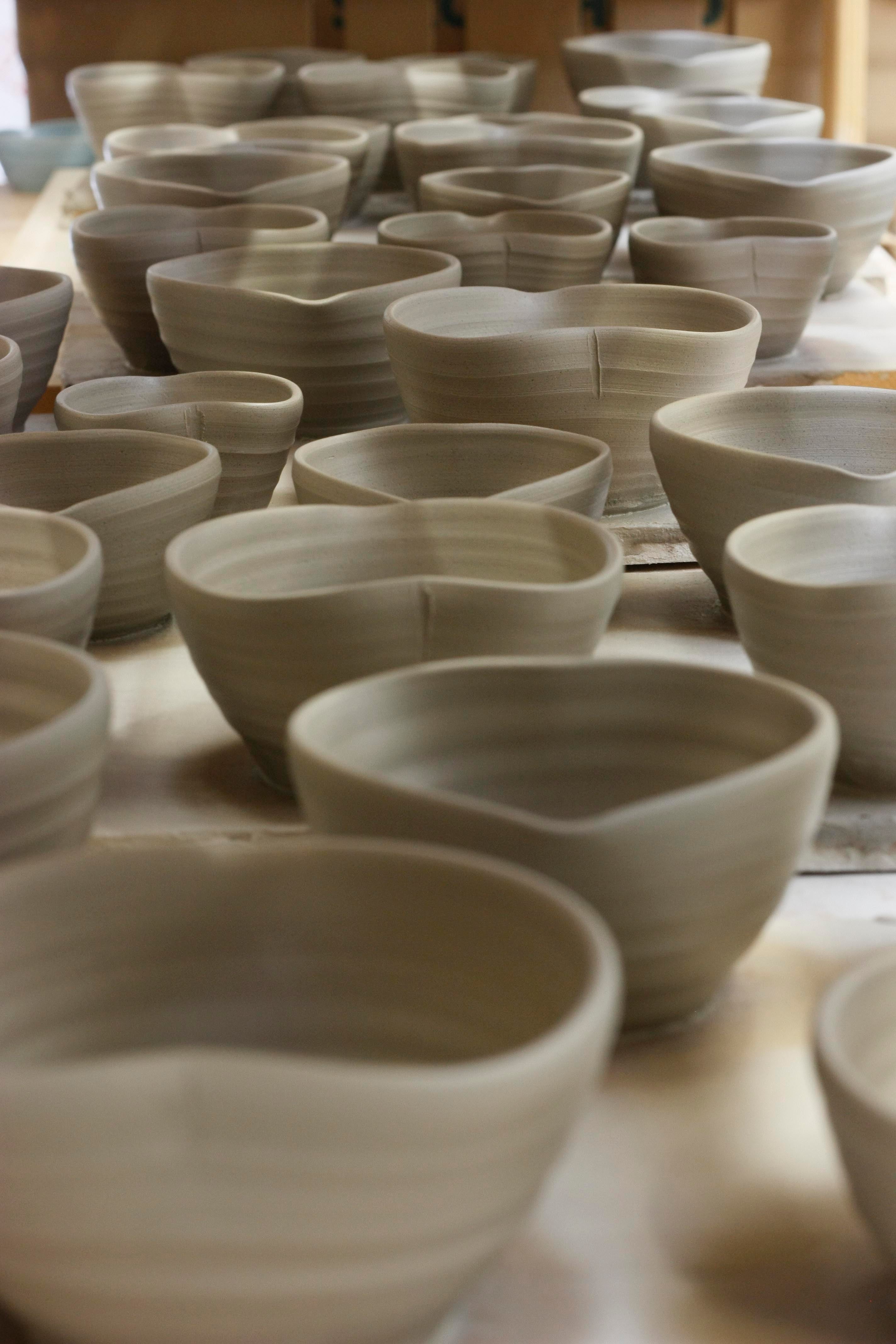 Heart dishes freshly thrown from stoneware clay
