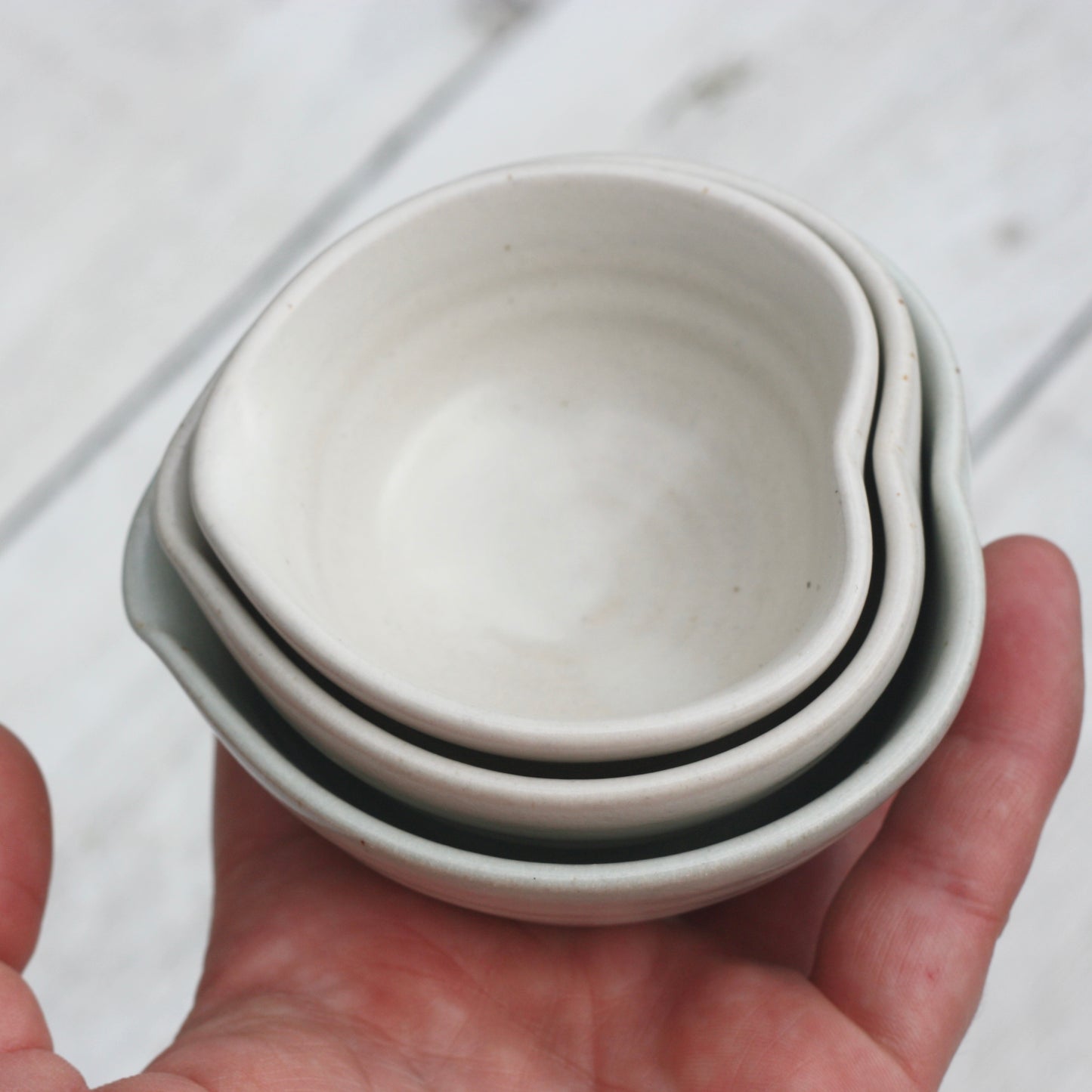 Small Set Stoneware Nesting Heart dishes in White Glazes